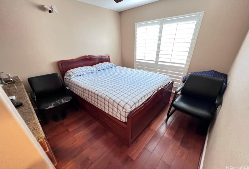 Den/BR #5: Downstairs with engineered hardwood flooring, Split AC & Ceiling Fan. Full size bathroom directly across.