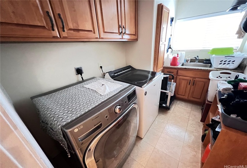 Inside Laundry room with sink