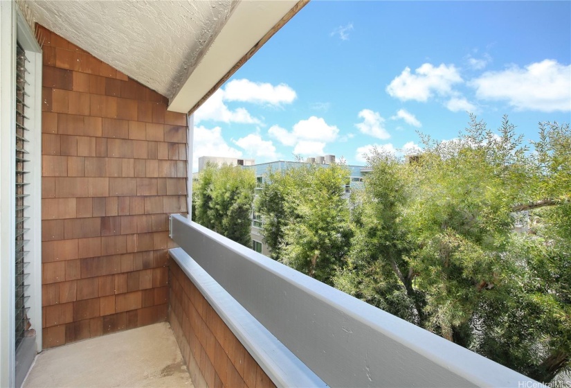 Private lanai off the primary bedroom.