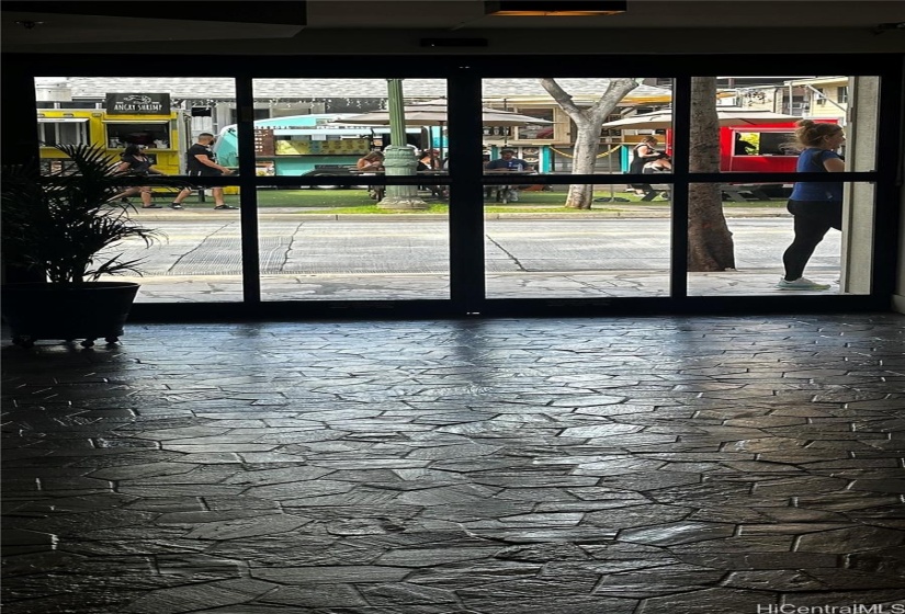 Main entrance lobby, facing food trucks across the street.