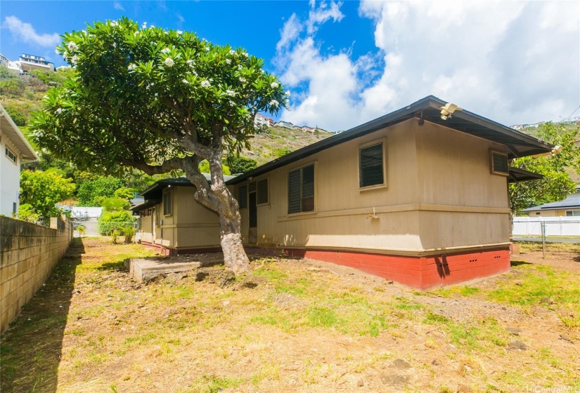 Closer view of the backside of the single family home.