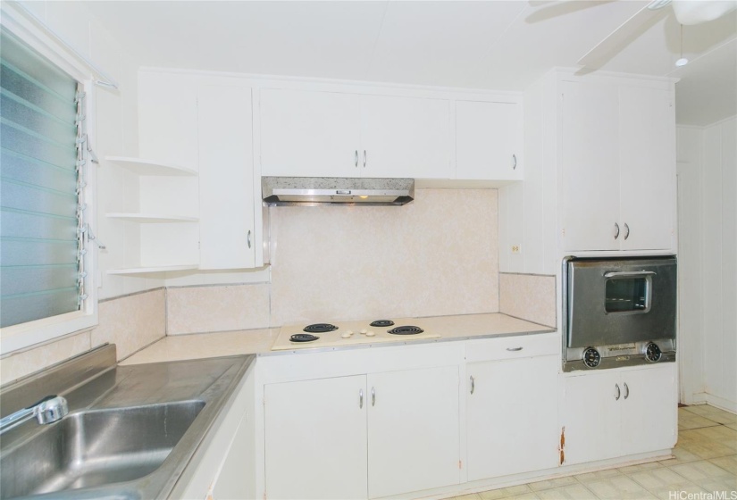 This kitchen is ready to be upgraded with your personalized touches.