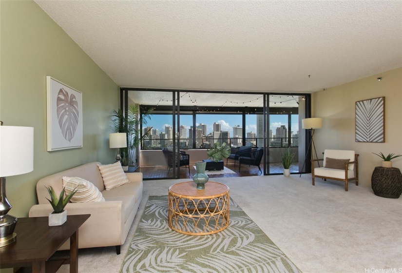 This spacious living room has plenty of room for entertaining. The views are incredible!