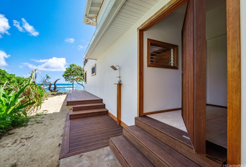 Outdoor shower and custom 5x8 swivel entry door.