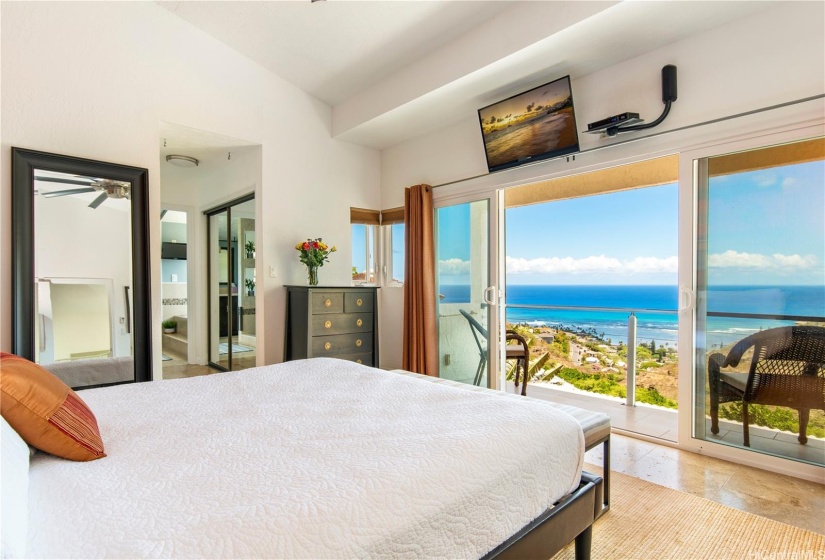 Primary bedroom with expansive ocean views...what a way to wake up!