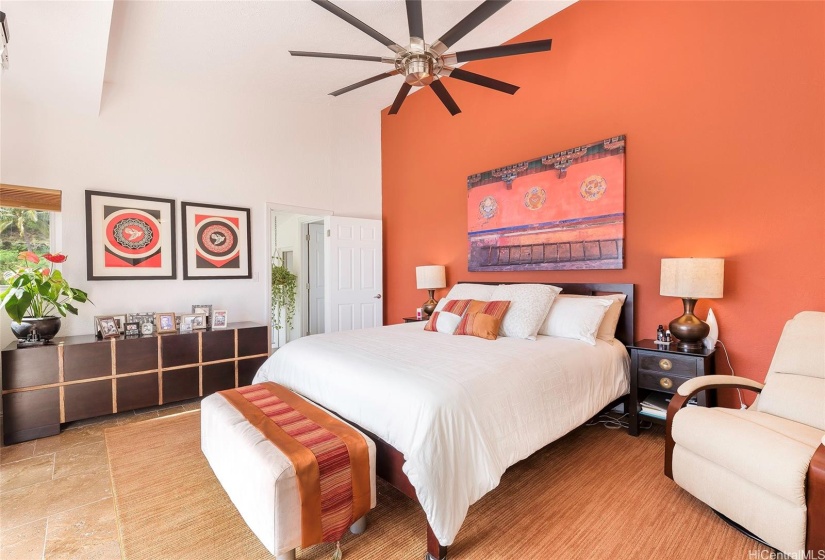 Primary bedroom has deluxe ensuite bath, walk-in closet and deck with ocean views.