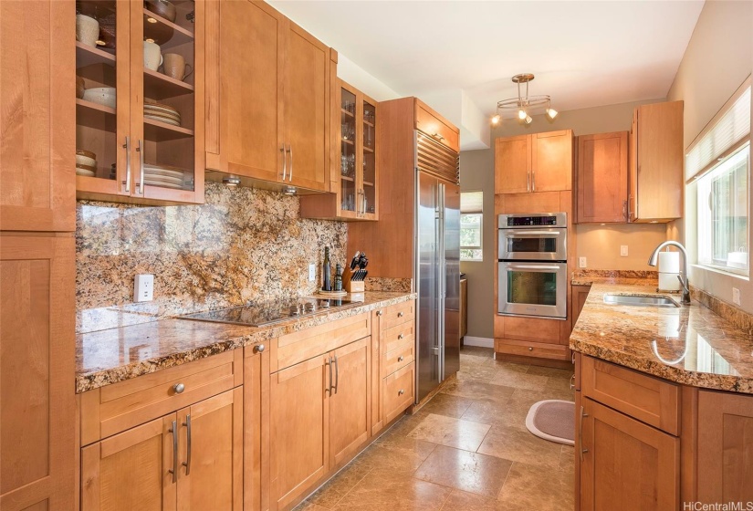 Kitchen with granite counters, travertine floors and SS appliances...all with views!