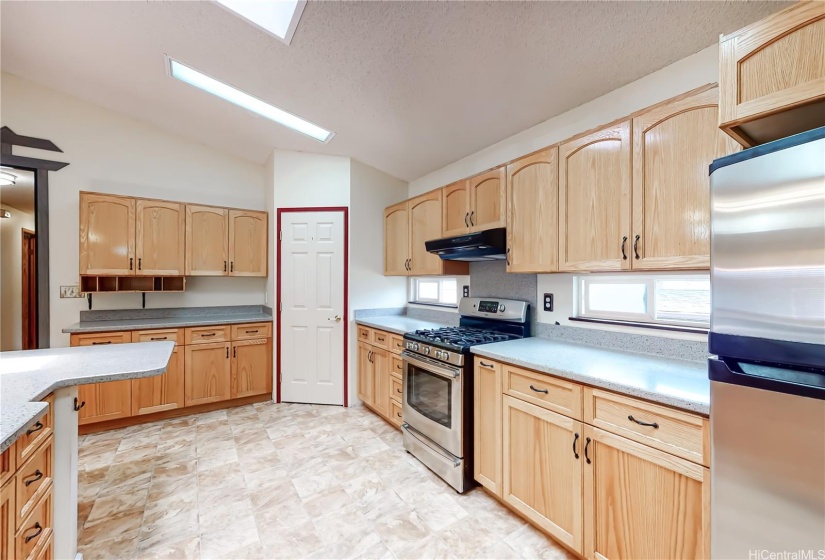 Kitchen Area with lots of cabinets.