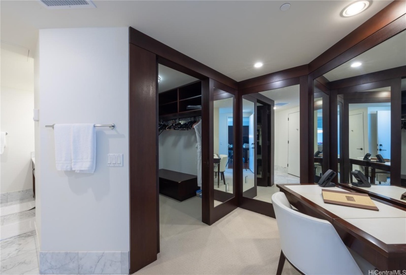 Walk-in closet in primary bedroom