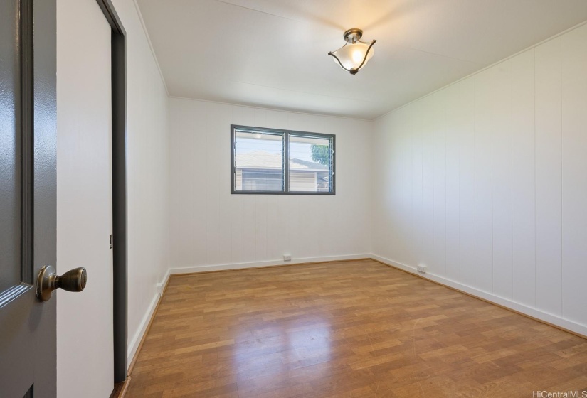 Bedroom 2 with laminate flooring