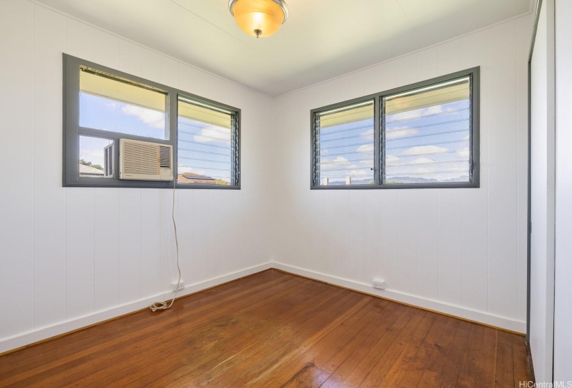 Bedroom 3 with hardwood floors