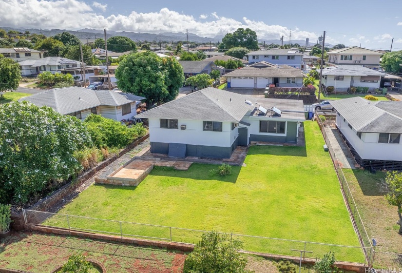 Over 6,100 square foot level lot with sprinkler system and fenced. Solar water heater saves energy