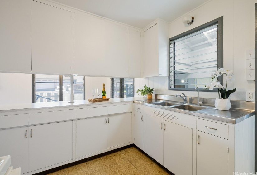 Original stainless steel double sinks and counter.