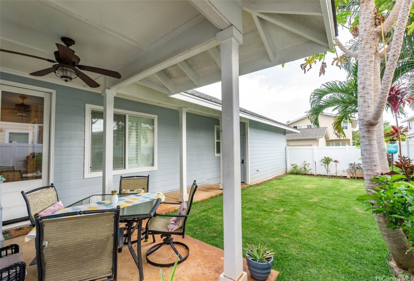 The covered patio and lush, green yard provide an ideal space for relaxation and entertaining.The covered patio and lush, green yard provide an ideal space for relaxation and entertaining.