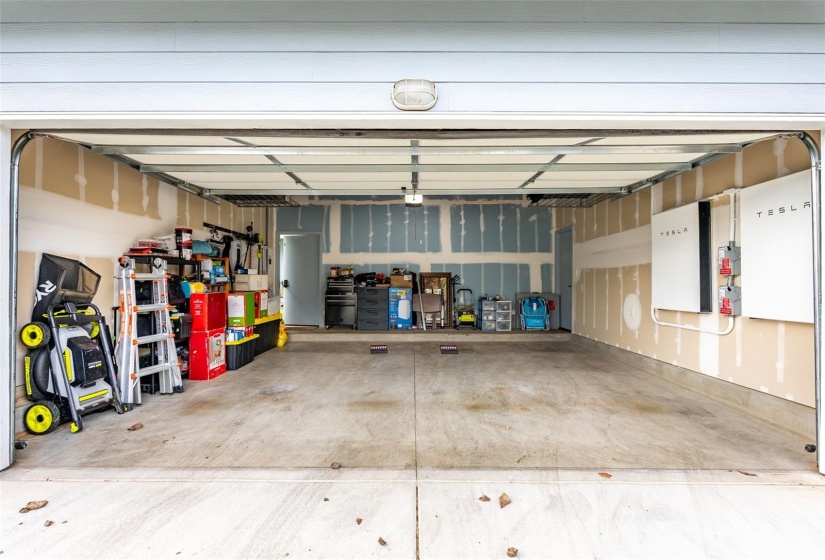 Two car garage with TWO Tesla batteries