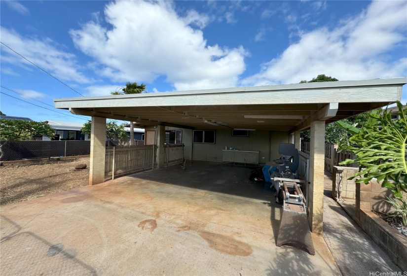 2 Car Carport & room to park additional cars on the driveway.