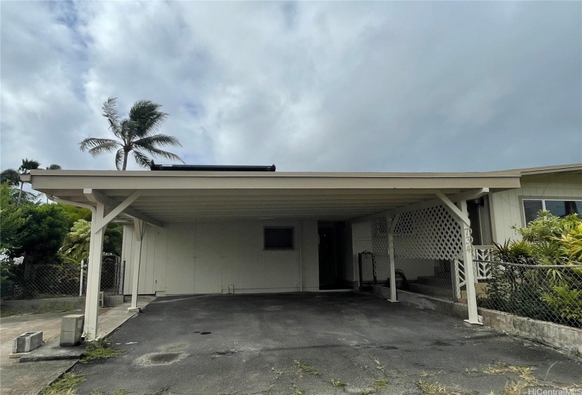 Covered 2-car carport.