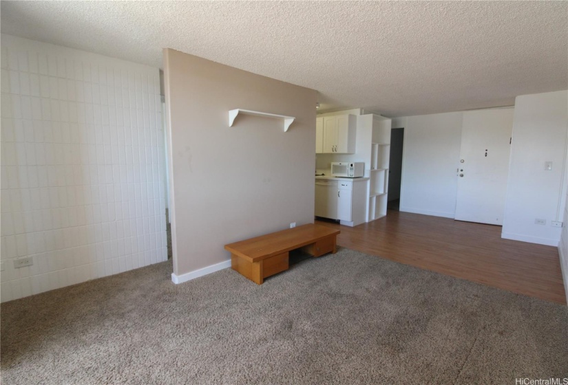 Other angle of living room with entrance to Main Bedroom