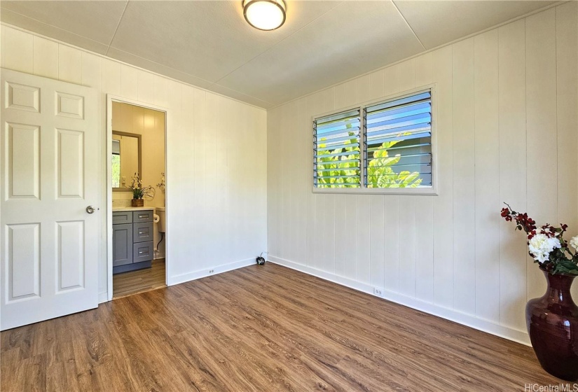 Primary bedroom with full bath on main house