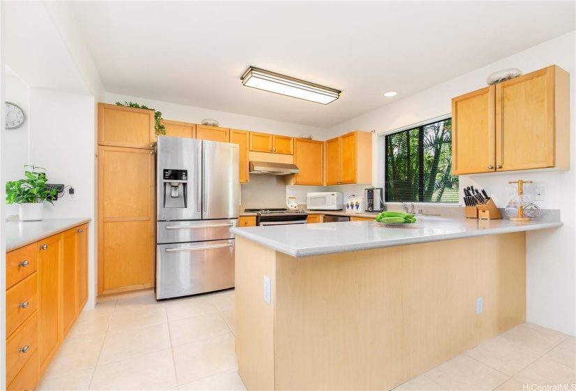 Bar seating and buffet counter in kitchen