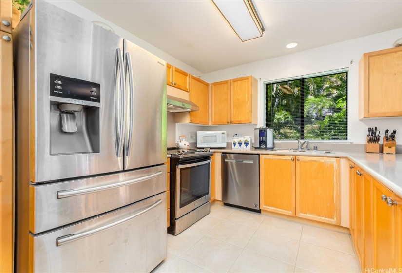 Spacious kitchen allows multiple people to use this area at the same time