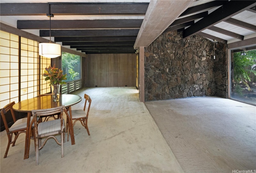 Living room/ Dining area look out to the pool