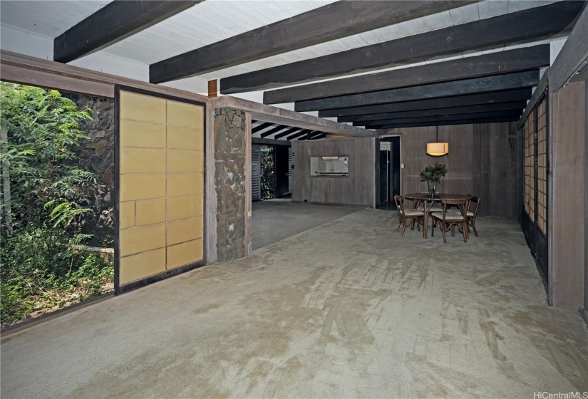View of tropical indoor outdoor gardens and kitchen.