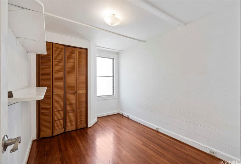 2nd level bedroom with no carpet, wood floors could be beautiful once it's refinished!