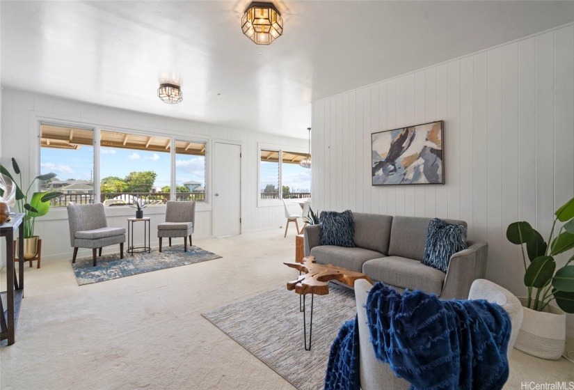 Top floor living room with great views with lots of light coming in to the house