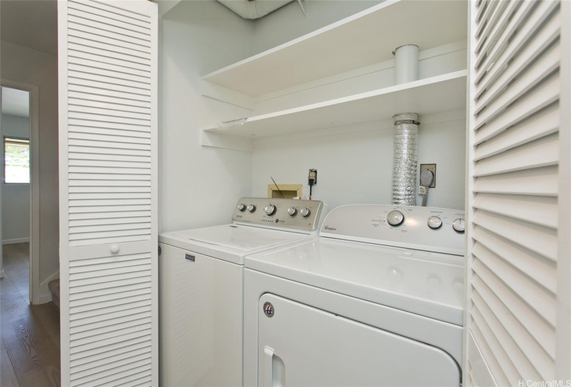 Laundry area with full sized washer and dryer