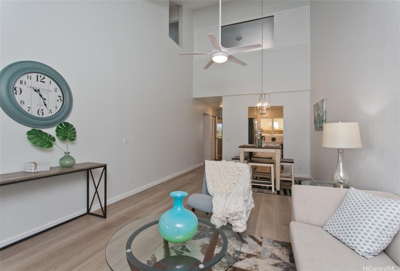 Large living room & dining area with vaulted ceiling