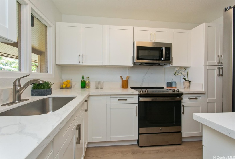 New cabinets, countertops and appliances.