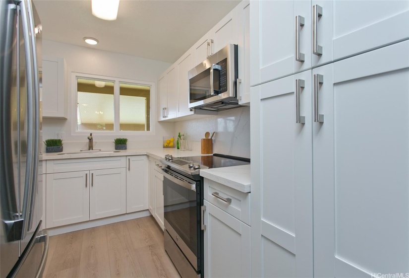 New cabinets, countertops and appliances.