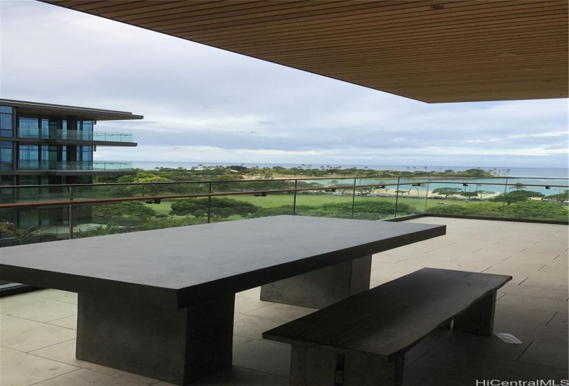 Strong concrete big table in lanai for rain or shine use. NO NEED TO MOVE EVEN THERE IS STRONG WIND.