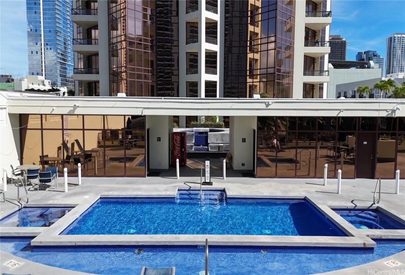Large pool with hot tub.