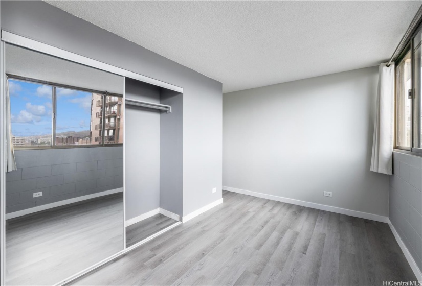 Bedroom area featuring large closet space