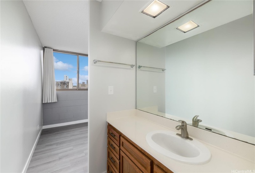 A generous sized vanity area with ample storage space