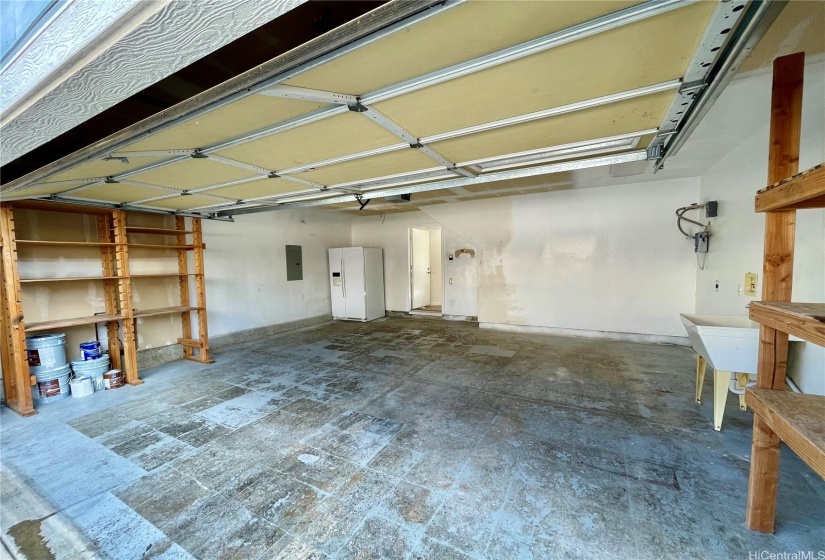 418 sqft garage w/ built in shelving