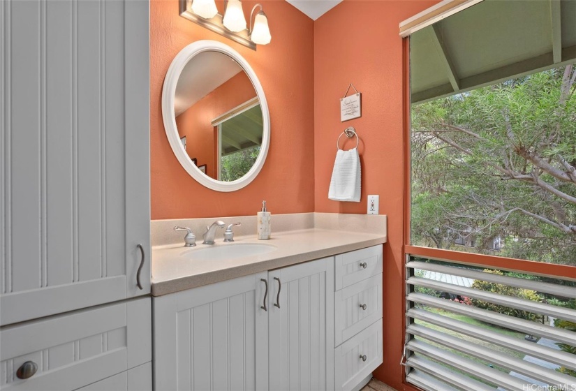 master bathroom with lots of views of the greenery