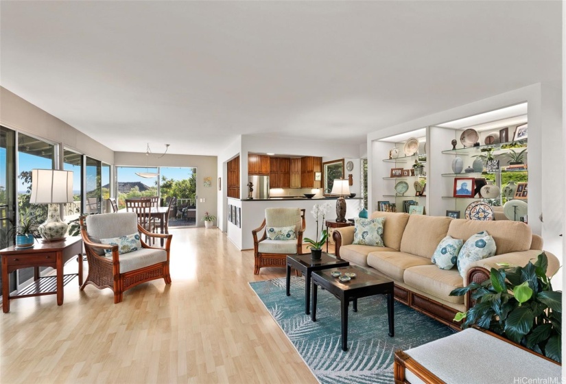 large open living room space connected to the kitchen, dining room and lanai