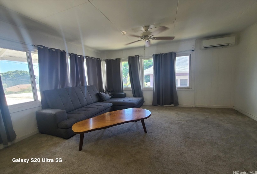 New carpet and spit ac keeps the living room cool and comfortable