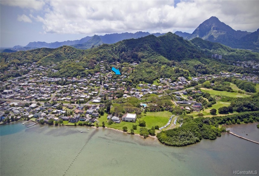 YWCA and Kaneohe Bay Drive in lower half, arrow at lot, and Friendshipgardens.org hiking in the green space above the blue arrow. Kailua to left just out of this photo and the rest of Kaneohe to the right.