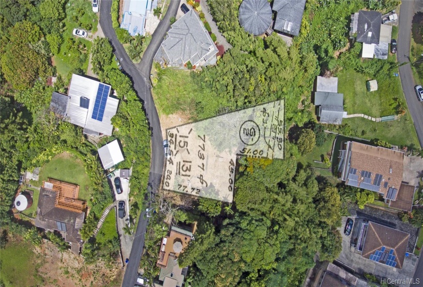 A higher view of the lot with the plat map above, only an approximation of lot location in photo.