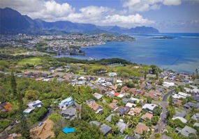 This is the one and only Kokokahi neighborhood above Kaneohe Bay, the fishpond, the mountains, and the vacant lot at a 122 foot elevation. Kokokahi means 