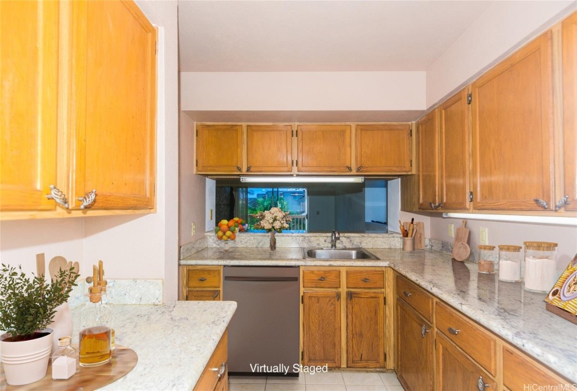 Dishwasher is virtually staged.