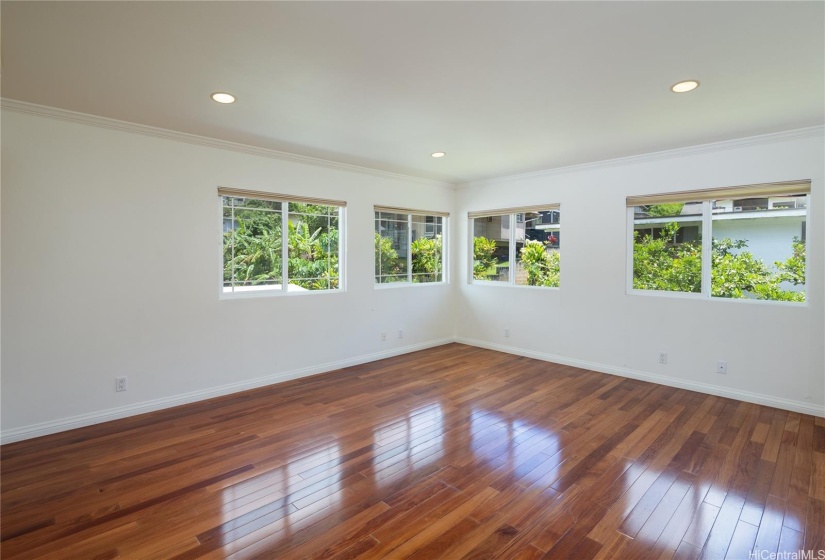 The primary bedroom offers great natural lighting, views of the Ko'olau at the back of the valley, plus a full bath and terrific closet!  There's also an a/c split system!