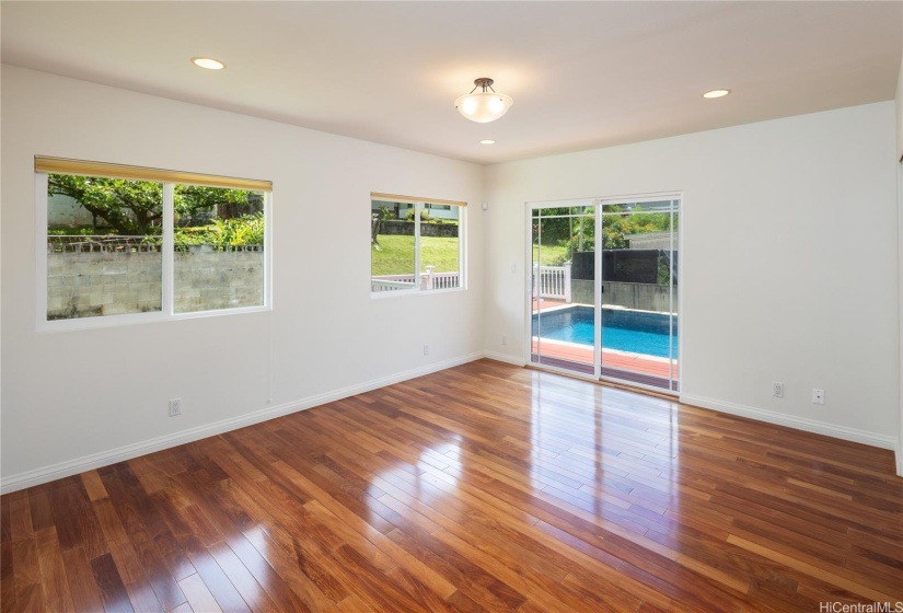 This could be a family room or a 4th bedroom if needed.  It opens out to the pool deck.