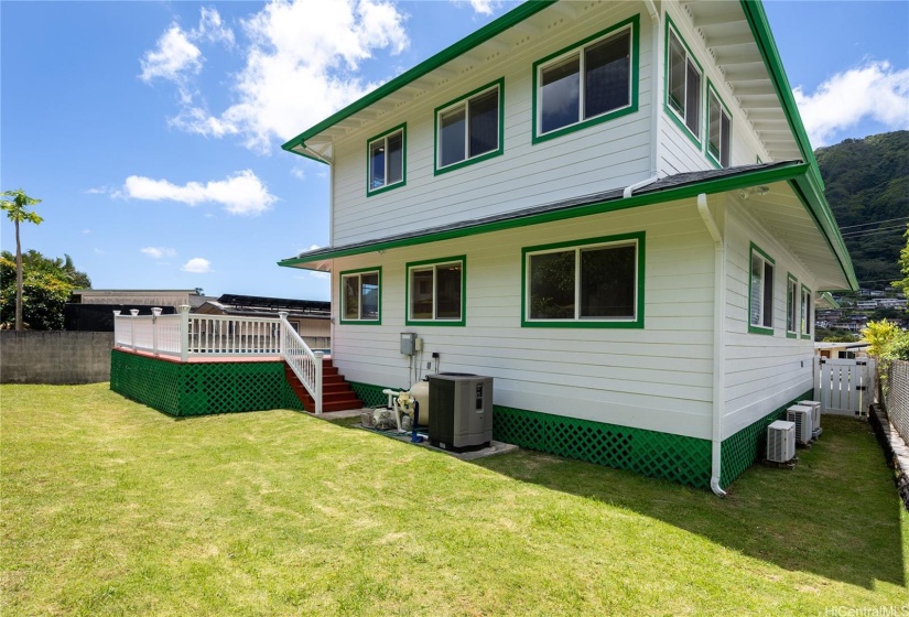 Enjoy the beauty of Manoa in your backyard, which is completely fenced