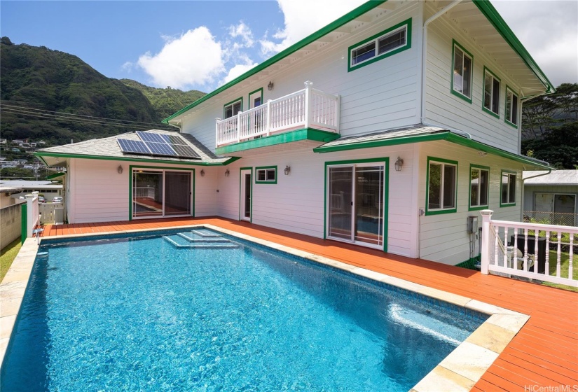 Lovely Pool & deck with sliding doors to Kitchen and Family Room! There's always time for a quick dip to cool or energize you!