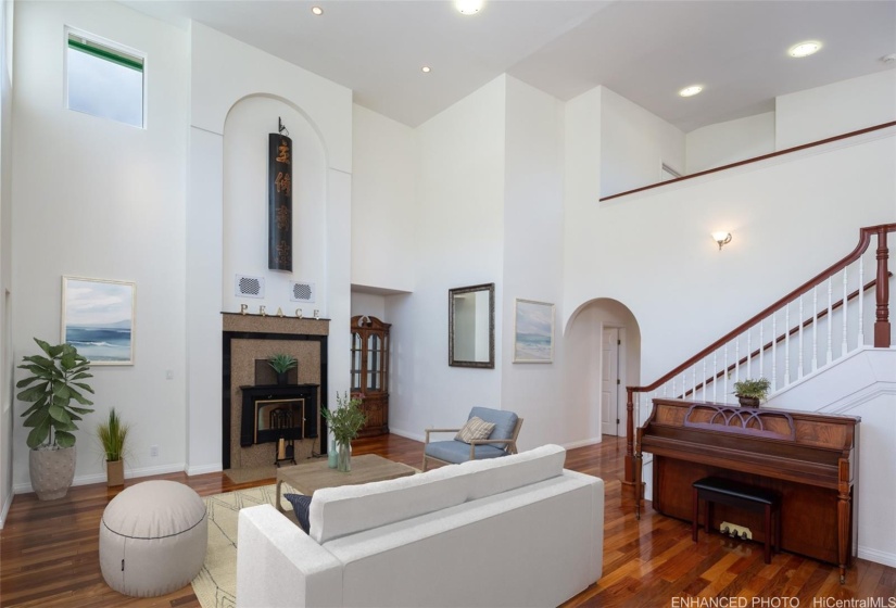 Enhanced photo of the living room.  Note the high ceilings !